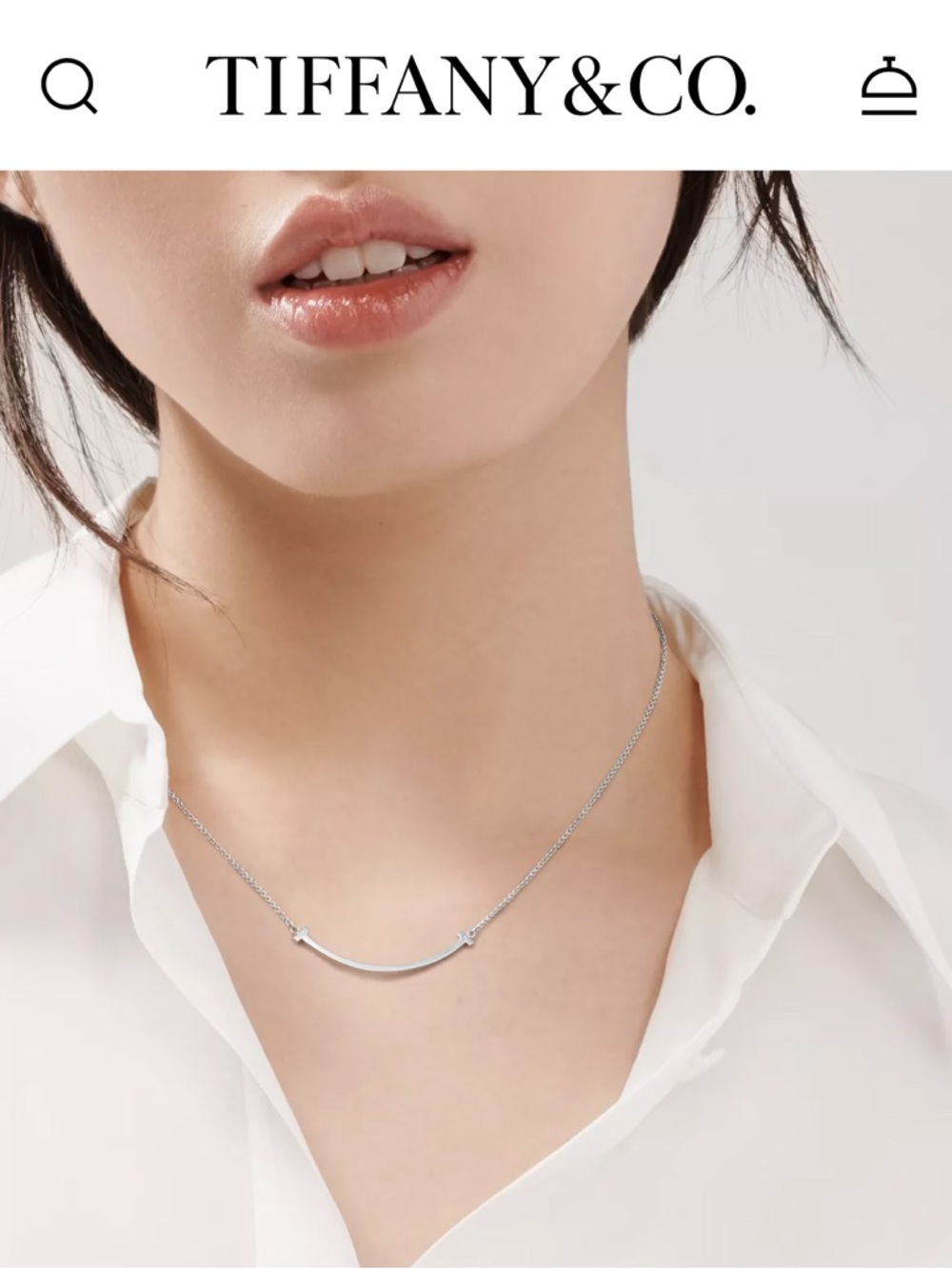 Tiffany & Co 18k white gold smile necklace. Price firm